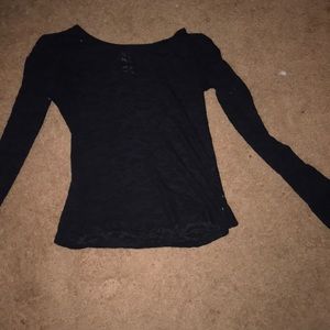 a long sleeve mesh shirt.